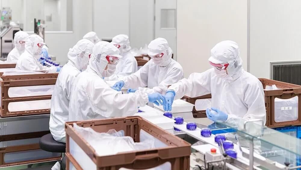 Production team supporting private label fragrance filling and packaging