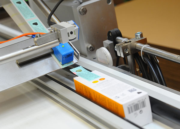 Labeling process for private label perfume packaging