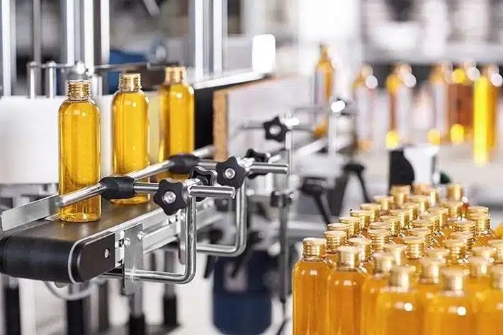 Perfume filling production line in fragrance manufacturing factory